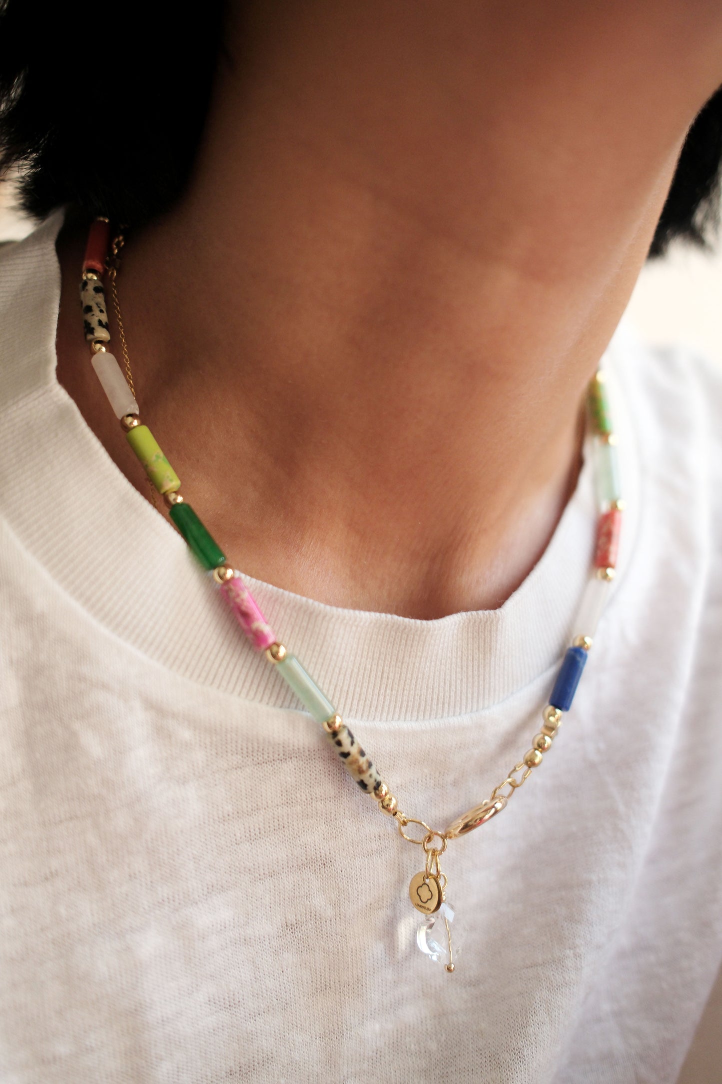 Collier bonbons multicolores tube