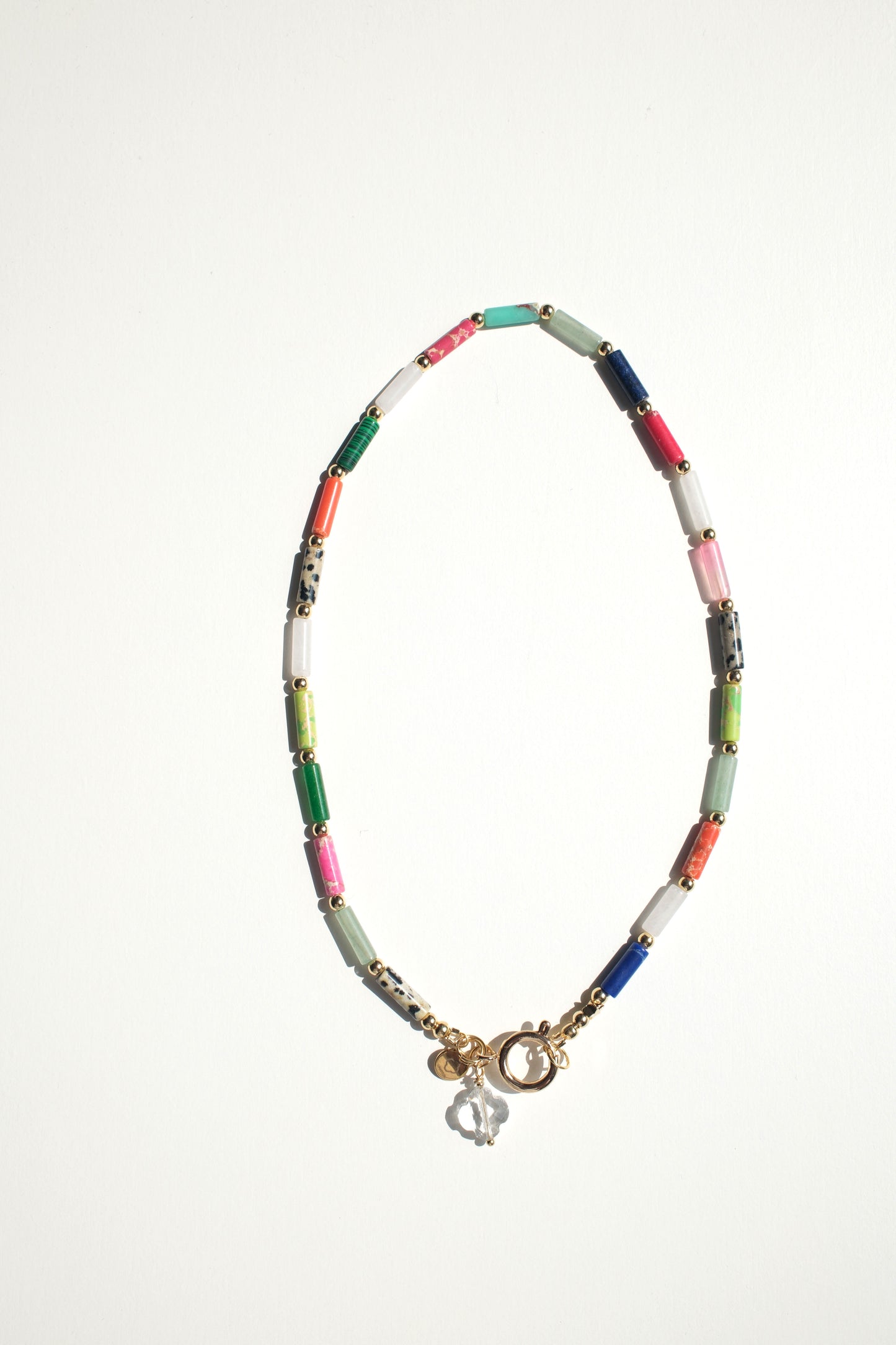 Collier bonbons multicolores tube
